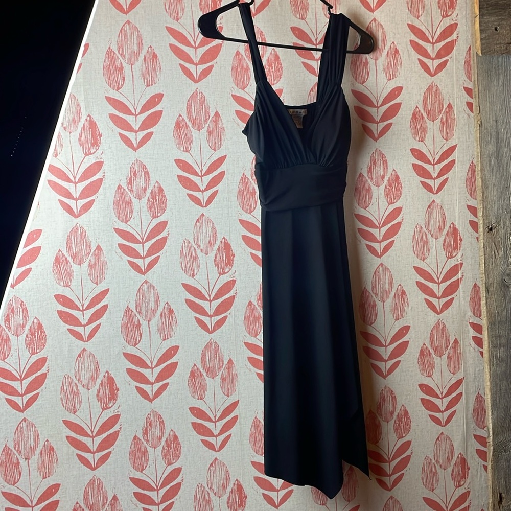 LaBelle Black Beauty! . Size small. Uneven hem, elastic upper back seam.